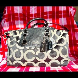 Coach Black/gray handle purse with shoulder strap.